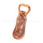 Vintage copper bottle opener with a coastal skyline and "Mallorca" engraving, featuring a heart-shaped handle with star cutouts. Perfect as a custom promotional gift or keepsake.