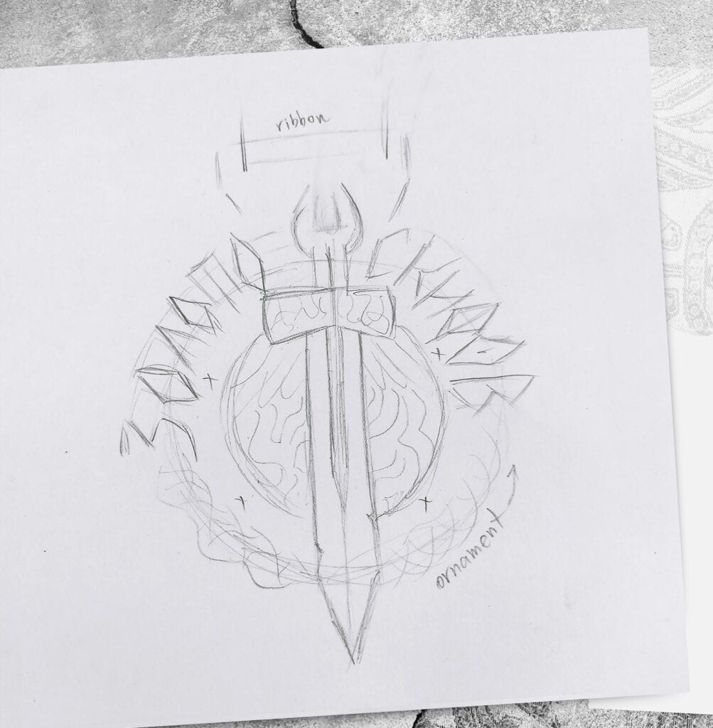 Hand-drawn design sketch of a custom trophy featuring a sword, jewel, and ribbon, prepared for promotional awards manufacturing.