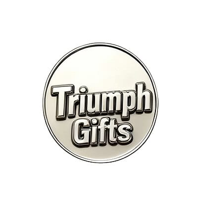 Shiny metal logo badge with "Triumph Gifts" engraved, showcasing custom promotional product branding.