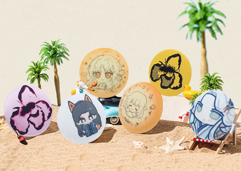 Colorful custom promotional balloons with anime and nature designs, set on a sandy beach with palm trees, starfish, and a toy car, showcasing personalized trophies, medals, and unique branding products.