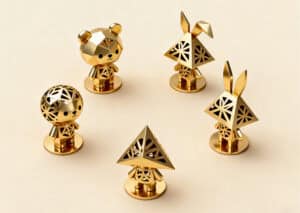Gold mini animal figurines with geometric design, including a bear, rabbit, and fox, perfect for promotional gifts and decorative displays.