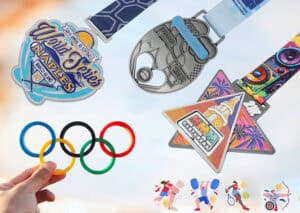 Brightly colored Olympic-themed medals, trophies, and promotional items displayed on a white background, showcasing custom branding options for corporate gifts and awards.