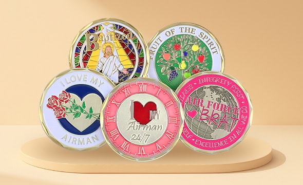 Collection of custom promotional coins and medals featuring various designs including religious, motivational, and corporate themes. Perfect for branding and recognition.